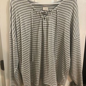 Long sleeve shirt with cross cross in front